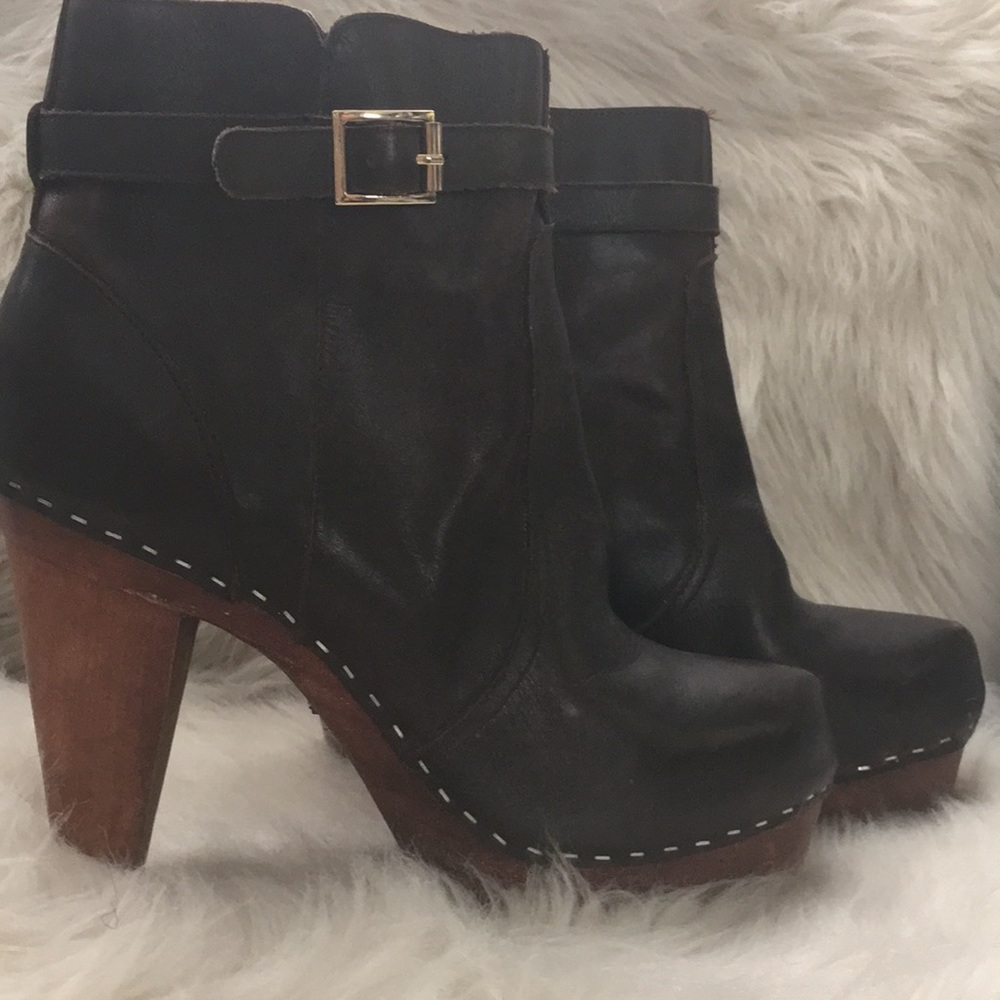 Brown, leather clog boots.